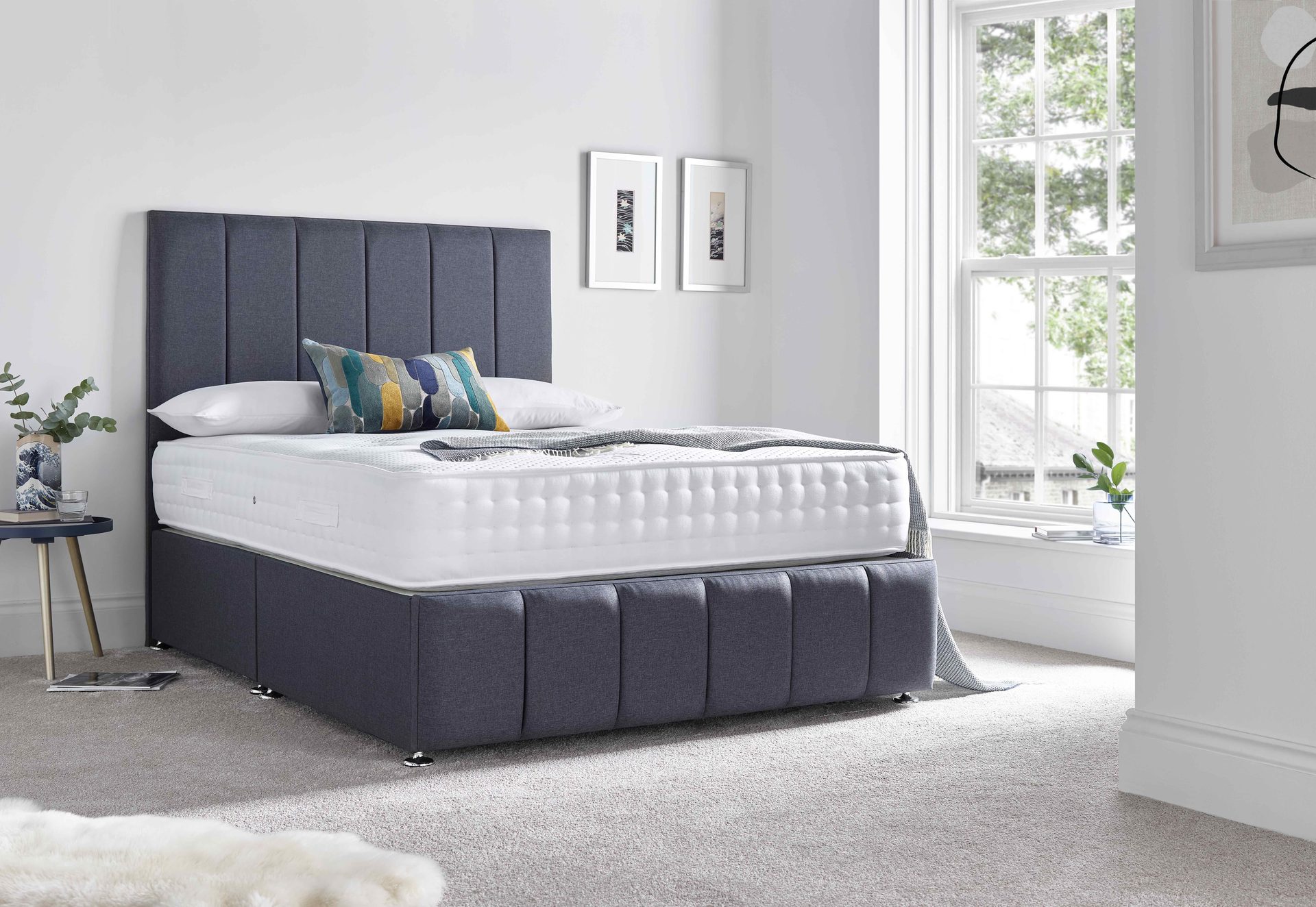 Upholstered bed in a styled bedroom